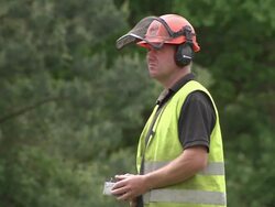 MS Shot of Man operating machinery with remote control unit / Cranbrook, Kent, United Kingdom Stock Footage