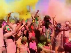 Group of people playing holi and dancing, Delhi, India Stock Footage
