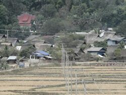 WS village and rice paddies / Xam Neua, Laos Stock Footage