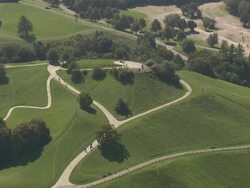Olympiapark,  Park from above, walking people, sunny, trees, lawn Stock Footage