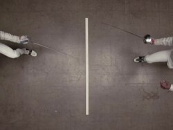 overhead view of fencer lunging forward towards his opponent Stock Footage