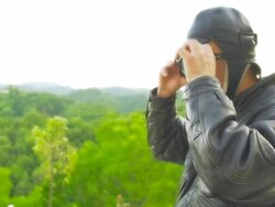 HD SLOW MOTION: Moto Rider Taking Off Flying Goggles Stock Footage