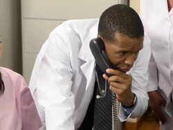 Doctor Argues with Insurance Company - CU Stock Footage