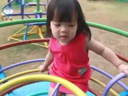 Girl is playing at amusement park Stock Footage