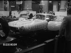 1953: MOTOR SHOW: WS Aston Martin DB2 Vantage ($6,000), Spanish Pegaso Z102 coupe w/ trophy on hood ($29,000), Mercedes Benz 300S convertible, Italian Ferrari 212 Inter Pinin Farina Coupe ($12,000), MS Briggs Cunningham C3 Coupe ($10,000). Instructional Video