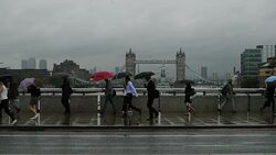 SLOW-MO: Londoners Brave Wet September Weather Stock Footage