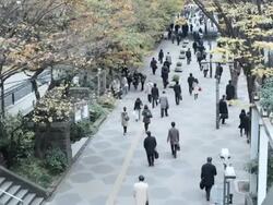 People going to work early morning in Shinjuku, Tokyo, Japan Stock Footage