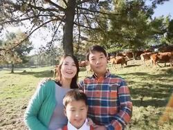MS TD Family are Smiling at cattle ranch / Yeongju, Gyeongsangbuk do, South Korea Stock Footage