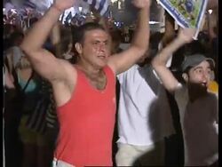 Greek fans celebrate victory in Euro 2004 News Clip