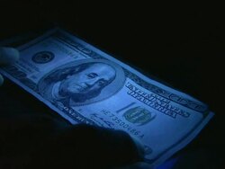 Counterfeit money dollars currency. Banking. Ultraviolet light. Stock Footage