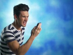 Upset man yelling in mobile phone Stock Footage