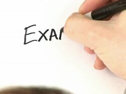 'Somebody writing ''Exam Results''' Stock Footage