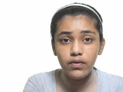 Cheerful Indian Teenager Girl talking reciting a story Stock Footage