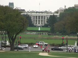 Long Shot static - Traffic passes the White House in Washington, D.C. / Washington, D.C., USA Stock Footage