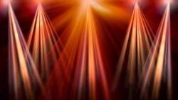 Colorful streams of white and golden lights rotate against a brown background. Stock Footage