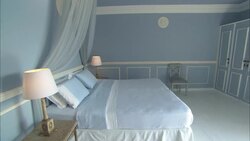 Doors to a hotel balcony frame a flowering tree at La Maison Hotel in Rio de Janeiro. Stock Footage