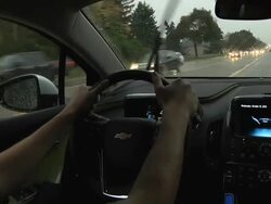 MS POV Driver behind wheel of electric car / Rochester, Michigan, United States Stock Footage