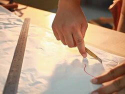 HD Dolly:Paper cutter to cut the line. Stock Footage