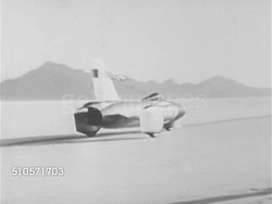 1964: BREEDLOVE SPEED RECORD: VS Truck smoothing Bonneville Salt Flats, speed recorder being set, WS United States Auto Club mobile office, VS People taking photographs, Craig Breedlove putting on goggles, walking flats, VS 'Spirit of America' Instructional Video