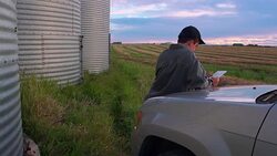 HD DOLLY: Farmer Checking his Crop Stock Footage
