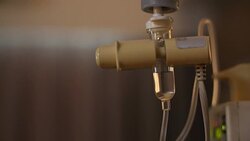 Infusion bottle with IV solution to help patient Stock Footage