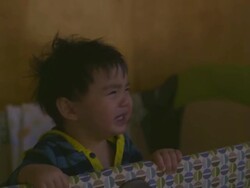 CU TU Baby standing in crib trying to getting mom's attention, mom waking up and grabbing baby / Los Angeles, California, United States Stock Footage