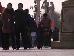 Crowds and police in Tiananmen Square News Clip