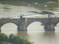 WS AERIAL View of pedestrian walking bridge over vitava river / Prague, Czech Republic Stock Footage