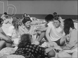 Men and women by the beach. USA, 1953 Stock Footage