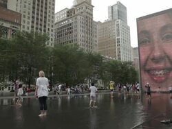 Chicago's Millennium Park water wall and Crown Fountain Stock Footage