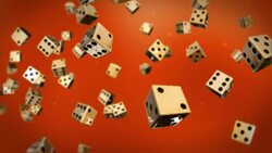 Black and white dice float past an orange background. Stock Footage