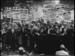 B/W August 28, 1963 leaders directing crowd with signs / March on Washington / newsreel Stock Footage