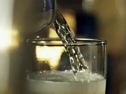 Beer poured into glass from can Stock Footage