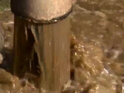 Sewage Water Pouring Out of Pipe Stock Footage