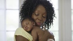 Mother with her newborn baby boy. Stock Footage