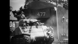 MOT 1945: BATTLE OF IWO JIMA: EQUIPMENT AND MEN ARRIVE AT THE BEACH Instructional Video