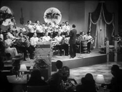 B/W 1940 Latin big band with band leader directing at front / documentary Stock Footage