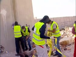 CLEAN: Palestinians tear down chunk of wall, 20 years after Berlin News Clip