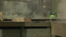 Metal parts being manufactured in factory News Clip