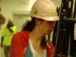 Female Construction Worker Cleans Benches Stock Footage