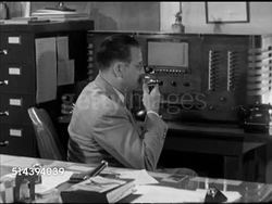 1952: COMMUNITY HIGH SCHOOL SUPERINTENDENT: VS Superintendent Herman Harrison at desk talking about educating high school students, practical training (SOT). Kansas, KS, education Instructional Video