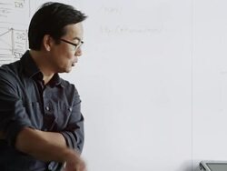 MS designer in high tech office discussing project Stock Footage