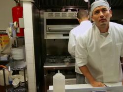 Chefs working in commercial kitchen Stock Footage