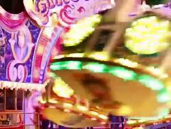 MS Shot of People enjoying amusement ride at funfair, flying bobs / Cologne, Germany Stock Footage