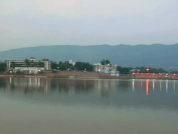 WS PAN Building near lake / Pushkar, Rajasthan, India Stock Footage