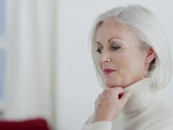 MS   senior woman  turning and smiling to camera Stock Footage