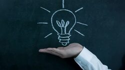 Lightbulb on chalkboard Stock Footage