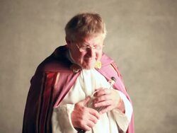 Priest drinking alcohol/wine Stock Footage