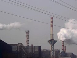 Steel factory is producing, chimney emissions. Stock Footage