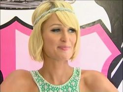 Whether she's jetting to the Cannes film festival, working on a scrapbook for her boyfriend or catching up on the ABC hit "Lost," Paris Hilton has no trouble filling her summer days. (May 28) News Clip